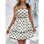 Plush Fashion Hub tie strap mini dress featuring smocked bodice and A-line silhouette, perfect for casual summer wear.