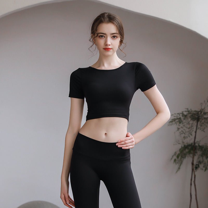 Plush Fashion Hub tight-fit yoga top with chest pad, breathable fabric, and stylish back design for activewear workouts.