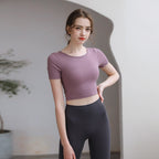 Plush Fashion Hub tight-fit yoga top with chest pad, breathable fabric, and stylish back design for activewear performance.