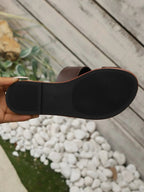 Women's vegan PU leather toe-loop flat sandals with comfortable design, perfect for everyday wear and casual outfits.