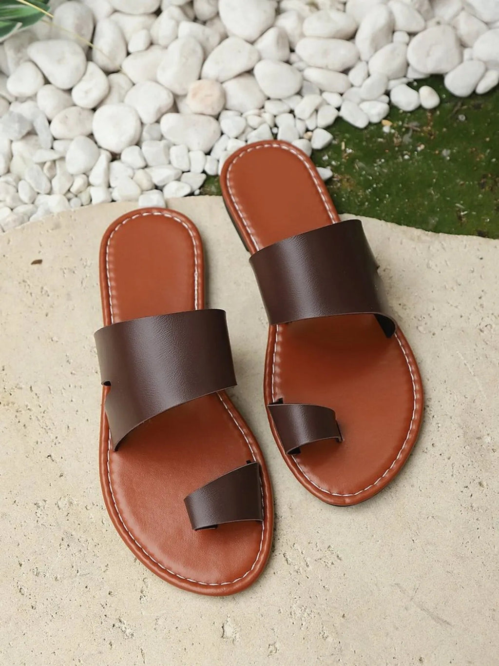 Women's vegan PU leather toe-loop flat sandals by Trendsi, featuring comfortable everyday slip-on shoe design.