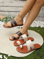 Women's vegan PU leather toe loop flat sandals by Trendsi, featuring comfortable everyday slip-on shoe design.
