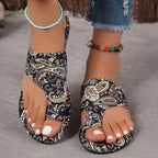 Women's PU leather toe-loop flat sandals featuring minimalist design and summer-ready style, perfect for casual wear.
