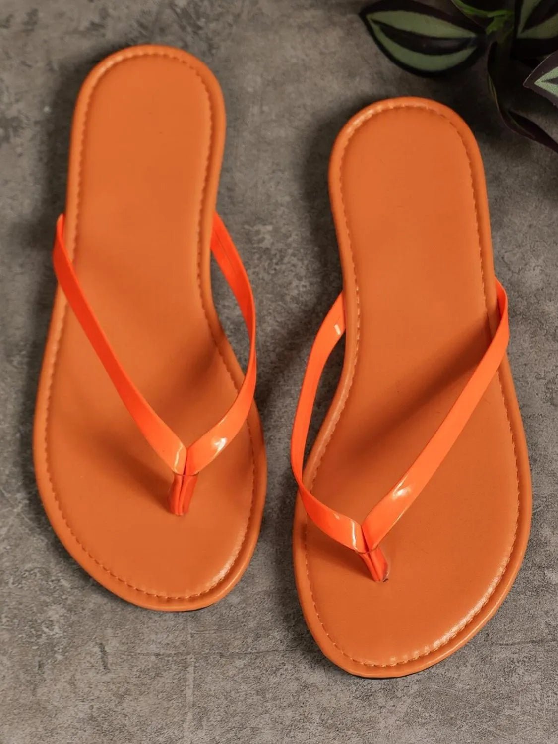 Women's chic PU leather toe post flat sandals, comfortable summer footwear with stylish design and minimalistic look.