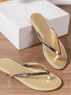 Women's chic PU leather toe post flat sandals by Trendsi, showcasing comfortable summer footwear with stylish design.