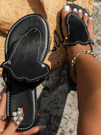 Women's PU leather toe post flat sandals by Trendsi, featuring comfortable summer footwear with minimalist design and open toe style.