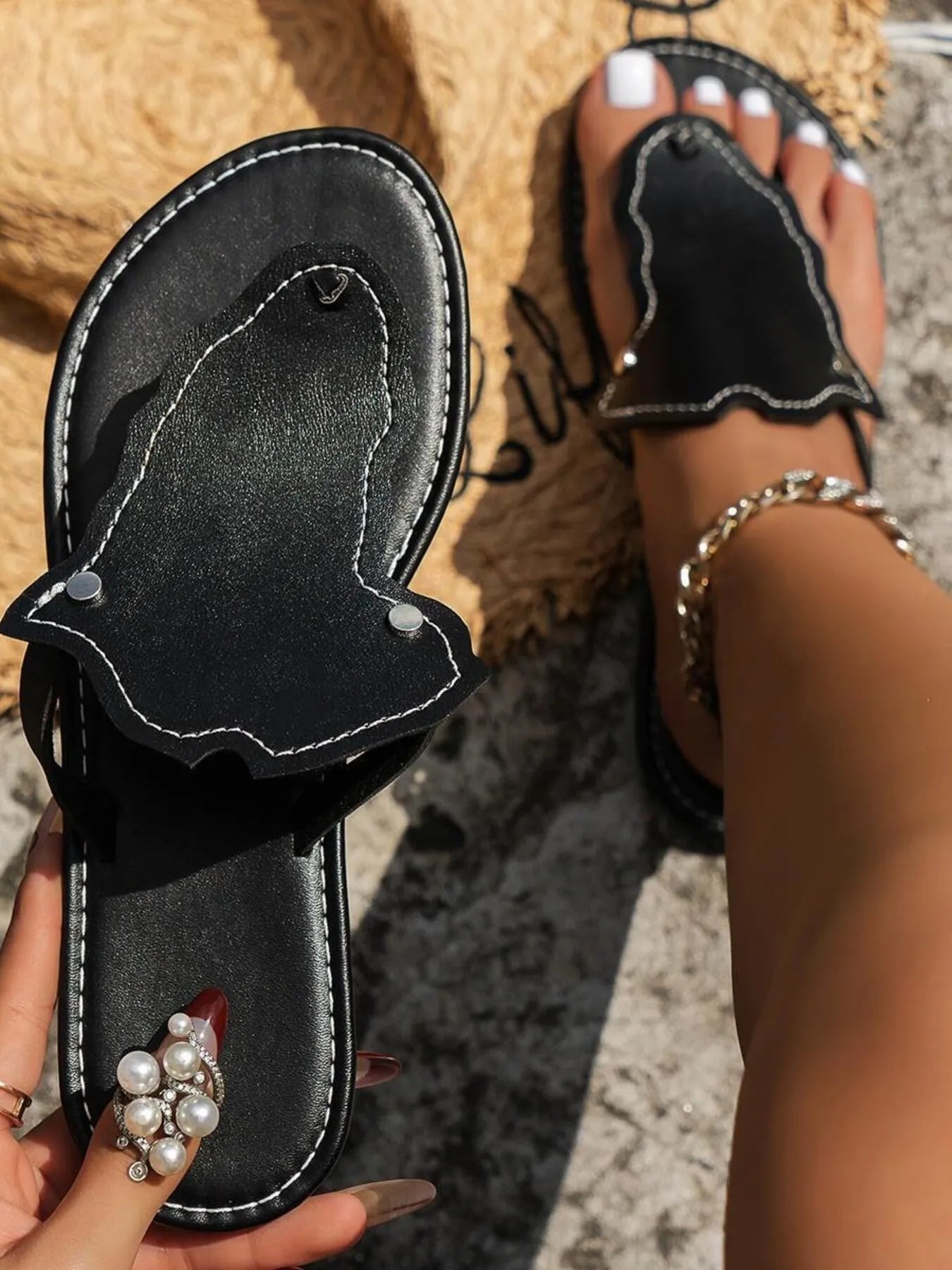 Women's PU leather toe post flat sandals by Trendsi, featuring comfortable summer footwear with minimalist design and open toe style.