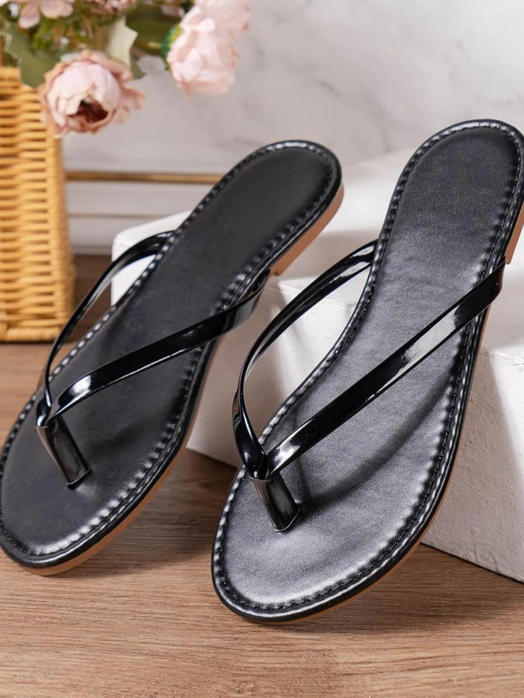 Women's chic PU leather toe post flat sandals by Trendsi, featuring comfortable summer footwear with stylish design.