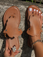 Women's PU leather toe post flat sandals by Trendsi, featuring comfortable summer footwear with open toe design.