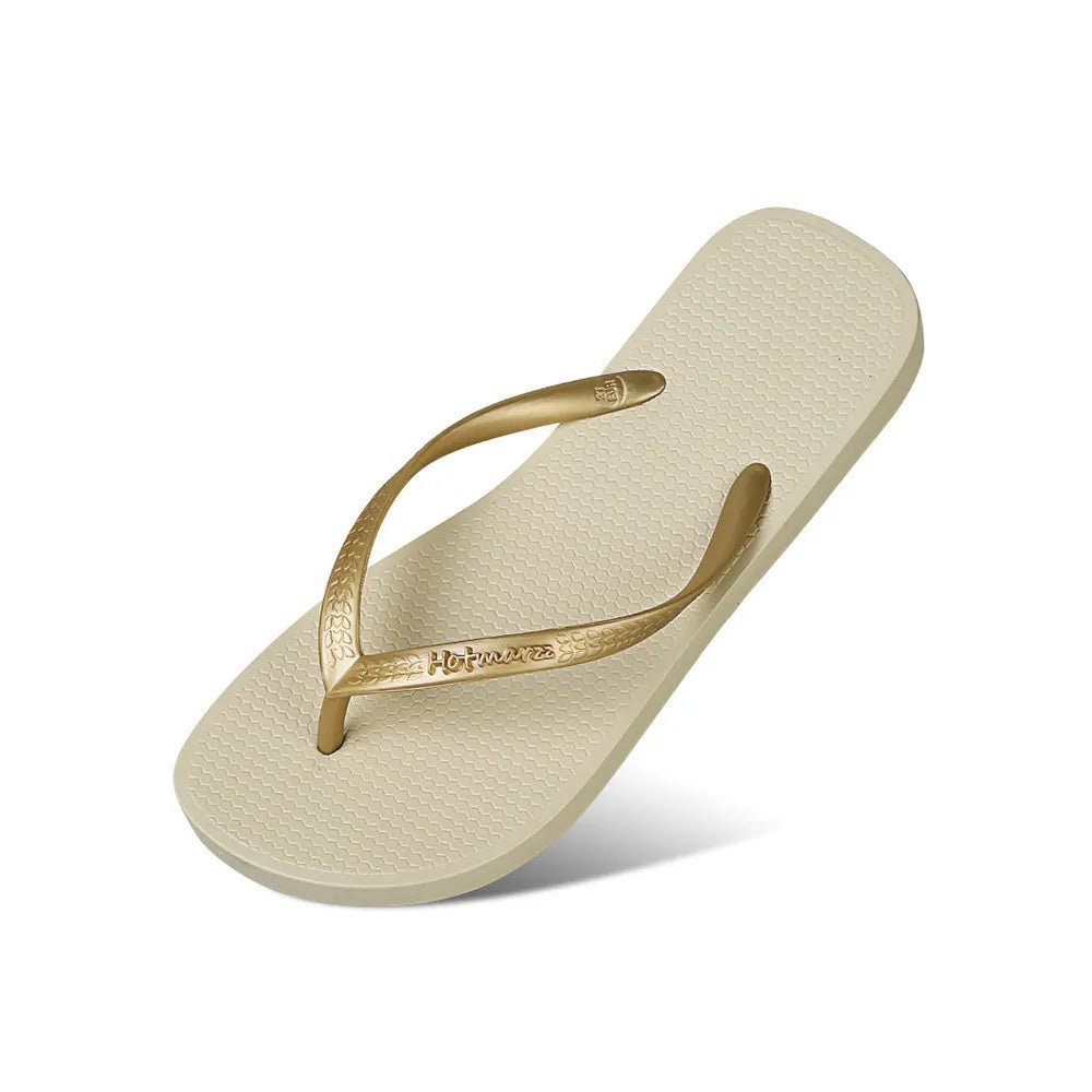 Women's minimalist rubber toe-post flat sandals with casual slip-on design and simple footwear style.
