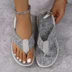 Women's Heathered Toe Post Flat Sandals by Trendsi, featuring comfortable strap design and casual style, shown in a close-up image.