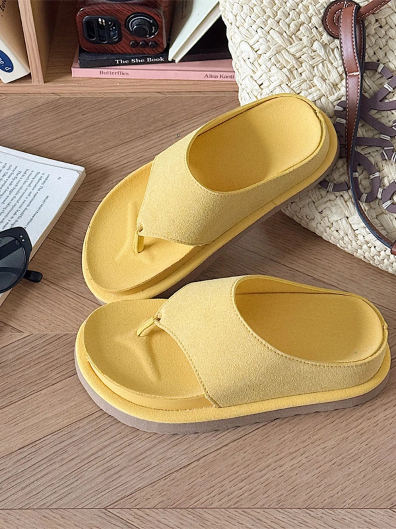 Women's lightweight toe-post platform flat sandals by Trendsi, featuring a comfortable design and summer-ready style.