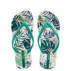 Women's tropical leaf print flat slides, lightweight botanical summer sandals with vibrant tropical leaf design.