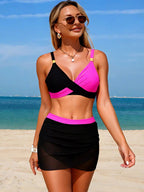 Women's two-tone cami and skort swim set featuring stylish, matching two-piece swimwear from Trendsi.