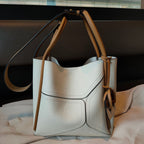 Contrast color basket underarm handbag with shoulder strap, plush fashion hub crossbody bag featuring stylish design.