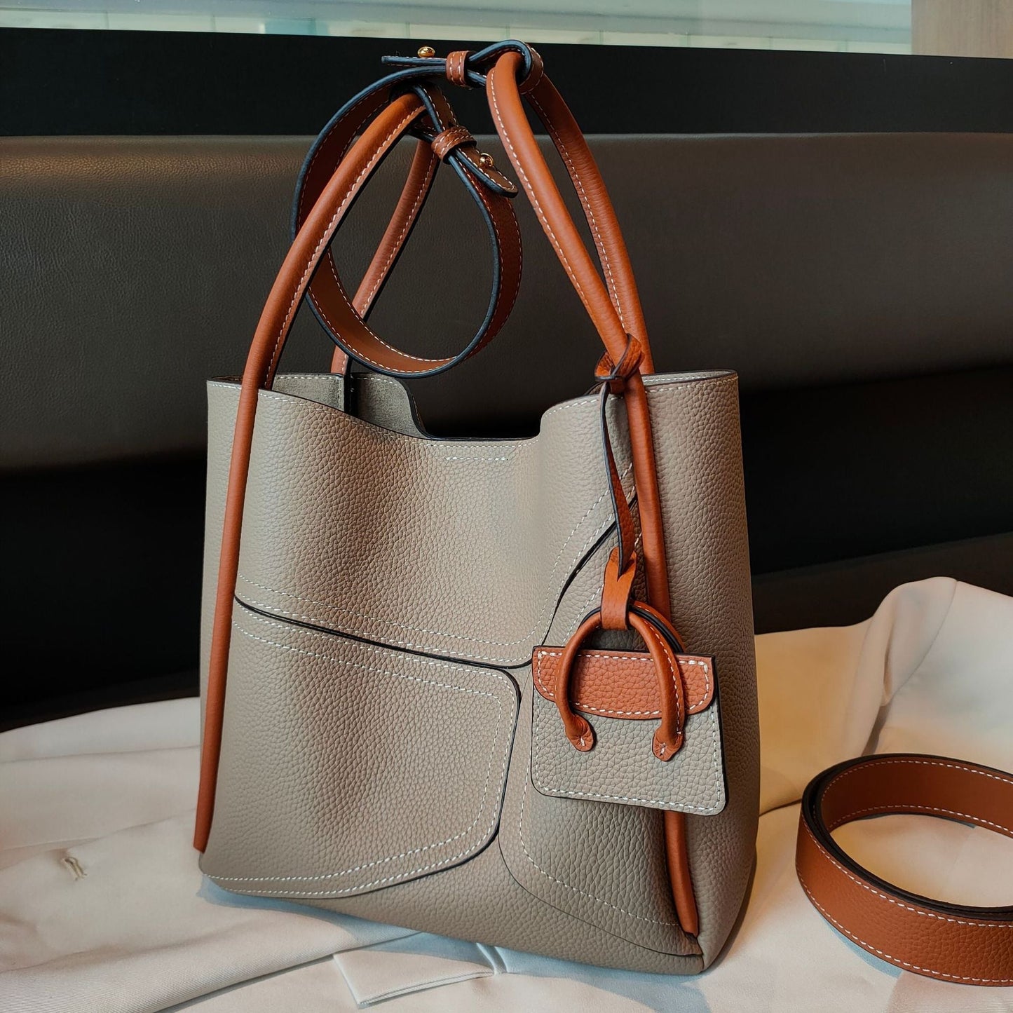 Contrast color underarm basket handbag by Plush Fashion Hub featuring shoulder and crossbody strap, stylish and versatile accessory.