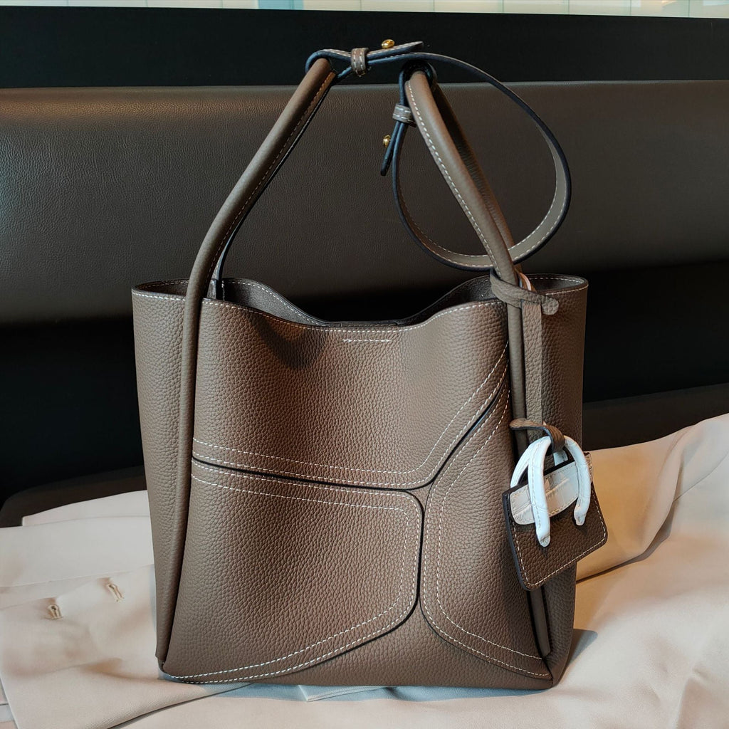 Contrast color basket underarm handbag by Plush Fashion Hub featuring shoulder and crossbody straps, stylish and compact design.