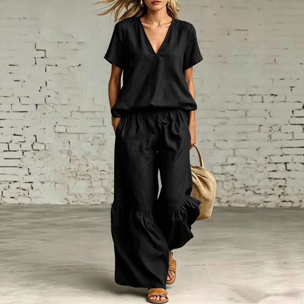 Plush Fashion Hub casualwear set with V-neck loose short-sleeve top and matching pants in 7 colors, available in sizes S to 5XL.
