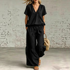 Plush Fashion Hub casualwear set with V-neck loose short-sleeve top and matching pants in 7 colors, available in sizes S to 5XL.