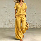 Plush Fashion Hub V-neck loose short-sleeve top and pants set in 7 colors, available in sizes S to 5XL, casualwear ensemble.