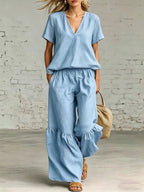 Casual V-neck loose short-sleeve top and pants set by Plush Fashion Hub in 7 colors, available in sizes S to 5XL.
