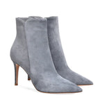 Women's black pointed toe ankle boots with super high heels, stylish design from Trendy Attic Store01.