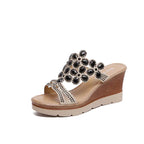 Women rhinestone platform sandals with heels featuring sparkling embellishments and open-toe design for stylish summer wear.