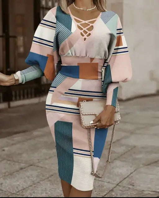 Elegant women's V-neck long sleeve pencil dress in black, fitted silhouette, made by Trendy Attic Store01.