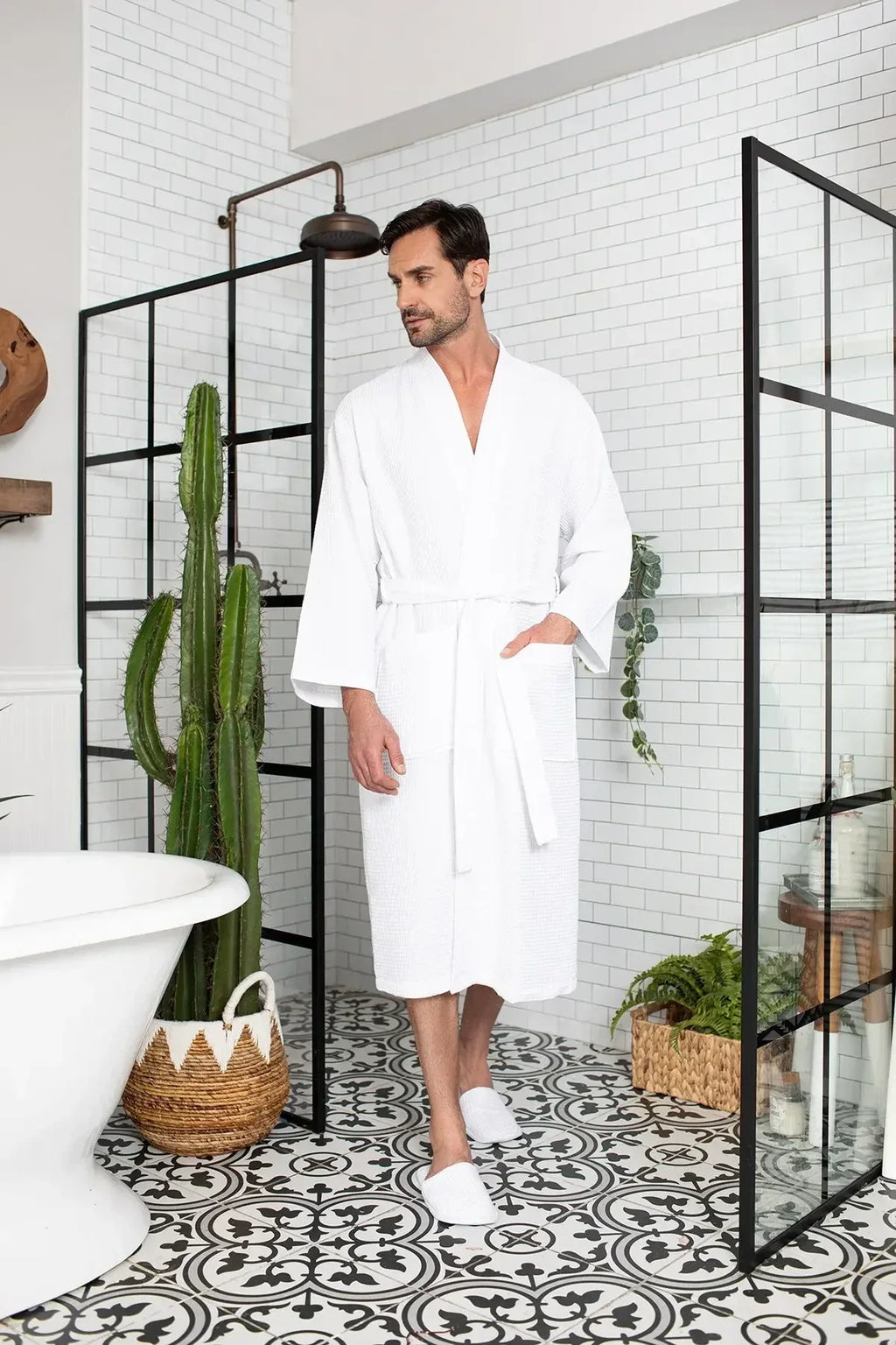 Absorbent and lightweight waffle spa bathrobe for men by Plush Fashion Hub, shown hanging with a cozy, textured fabric.