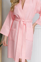Knee-length waffle robe for women by Plush Fashion Hub, showing soft waffle weave fabric and cozy fit.