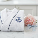 White knee-length waffle robe for women by Plush Fashion Hub, featuring a cozy, textured waffle fabric and relaxed fit.