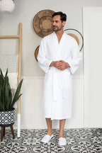 Plush Fashion Hub men's waffle spa bathrobe, lightweight and absorbent, shown in a soft white fabric for comfortable lounging.
