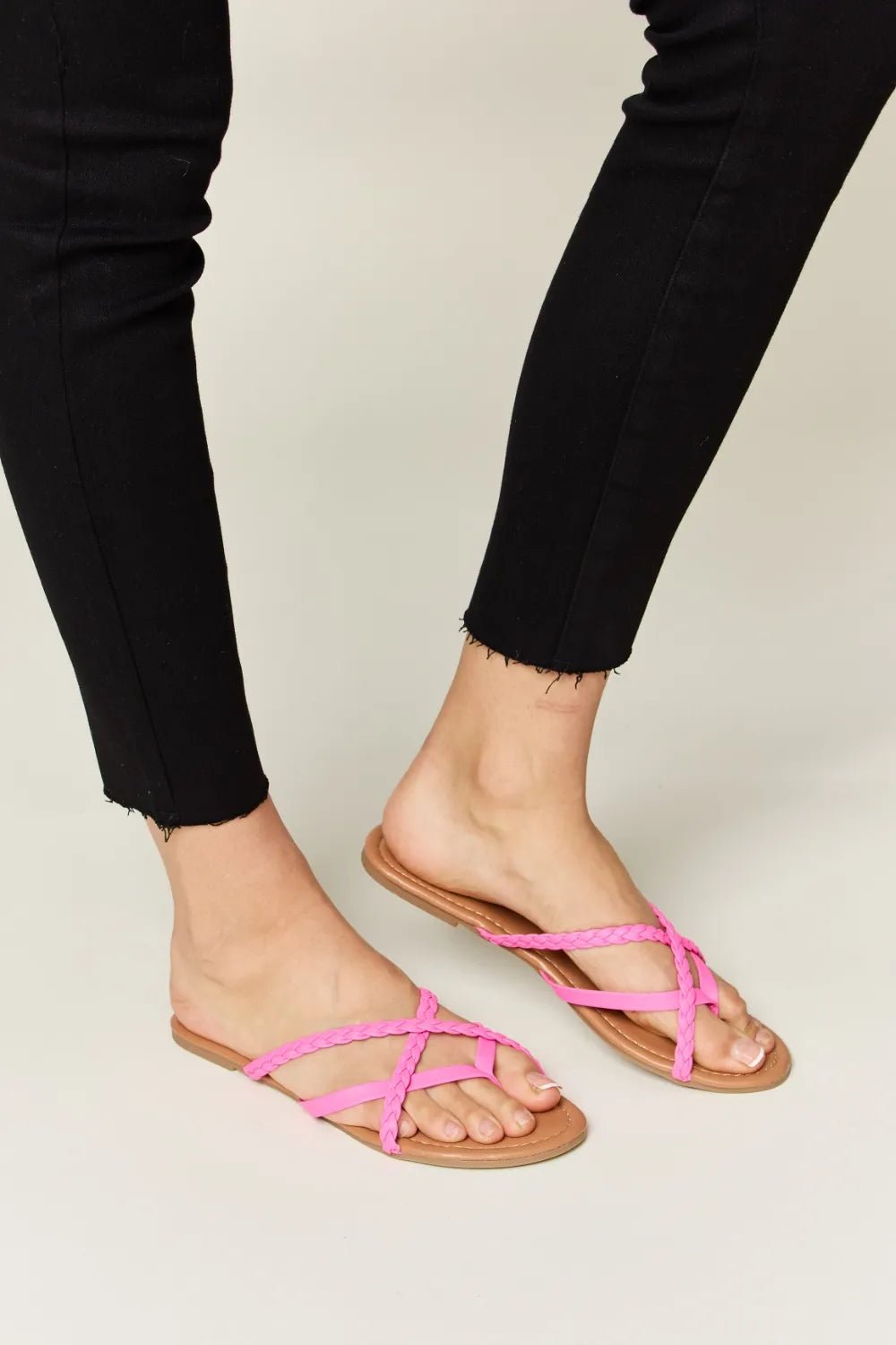 Women's crisscross PU leather open-toe sandals, trendy summer footwear with comfortable design and stylish straps.
