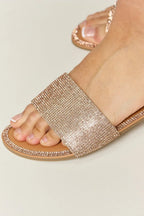 Women’s rhinestone open toe flat sandals by Trendsi featuring sparkling embellishments and a comfortable summer footwear style.