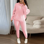 Winter ribbed knit women's trouser set featuring a loose pullover sweater and drawstring pants by Plush Fashion Hub.