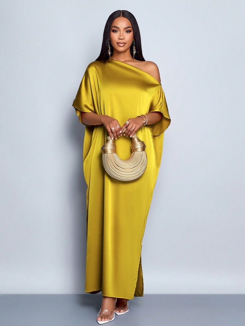 Yellow satin maxi dress for women by Bella Mia, perfect for early autumn, featuring a stylish and elegant design.