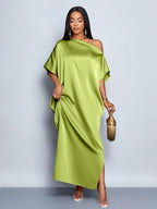 Yellow satin maxi dress for women by Bella Mia, perfect for early autumn, featuring a stylish and flowing satin fabric.