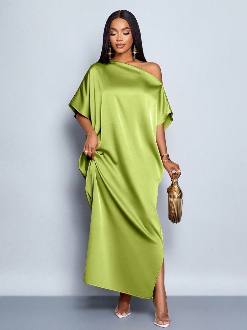 Yellow satin maxi dress for women by Bella Mia, perfect for early autumn, featuring a stylish and flowing satin fabric.