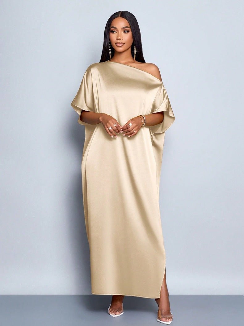 Yellow satin maxi dress for women by Bella Mia, stylish early autumn satin dress with elegant flow and smooth fabric.