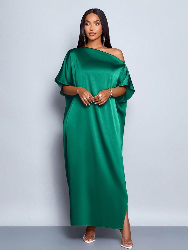 Yellow satin maxi dress for women, Bella Mia's early autumn satin clothing, flowing and elegant for stylish occasions.