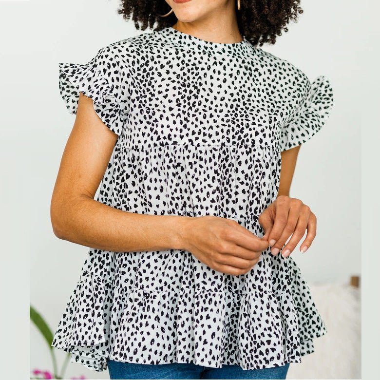 Bella Mia women's floral short sleeve swing shirt, small size, casual women's top with a feminine design and comfortable fit.