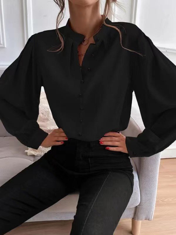 Elegant solid color women’s autumn shirt by Bella Mia featuring a collared long sleeve design and single row button detail.