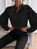 Elegant solid color women’s autumn shirt by Bella Mia featuring a collared long sleeve design and single row button detail.