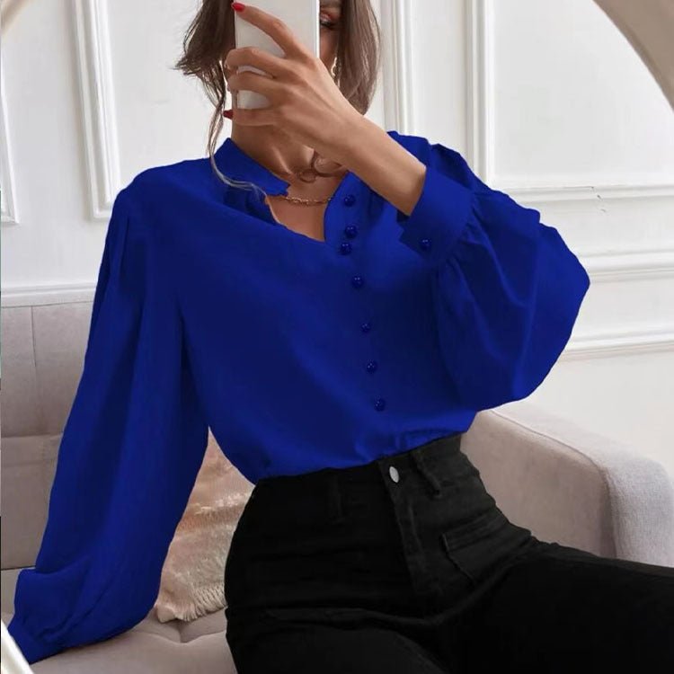 Elegant women’s long sleeve autumn shirt by Bella Mia with solid color, collared design, and single-row button front.