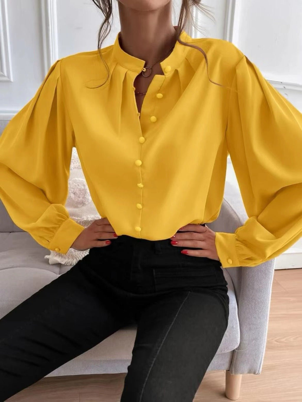 Elegant solid color women's long sleeve shirt with collar, buttons, and loose fit, perfect for autumn by Bella Mia.