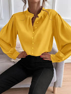 Elegant solid color women's long sleeve shirt with collar, buttons, and loose fit, perfect for autumn by Bella Mia.