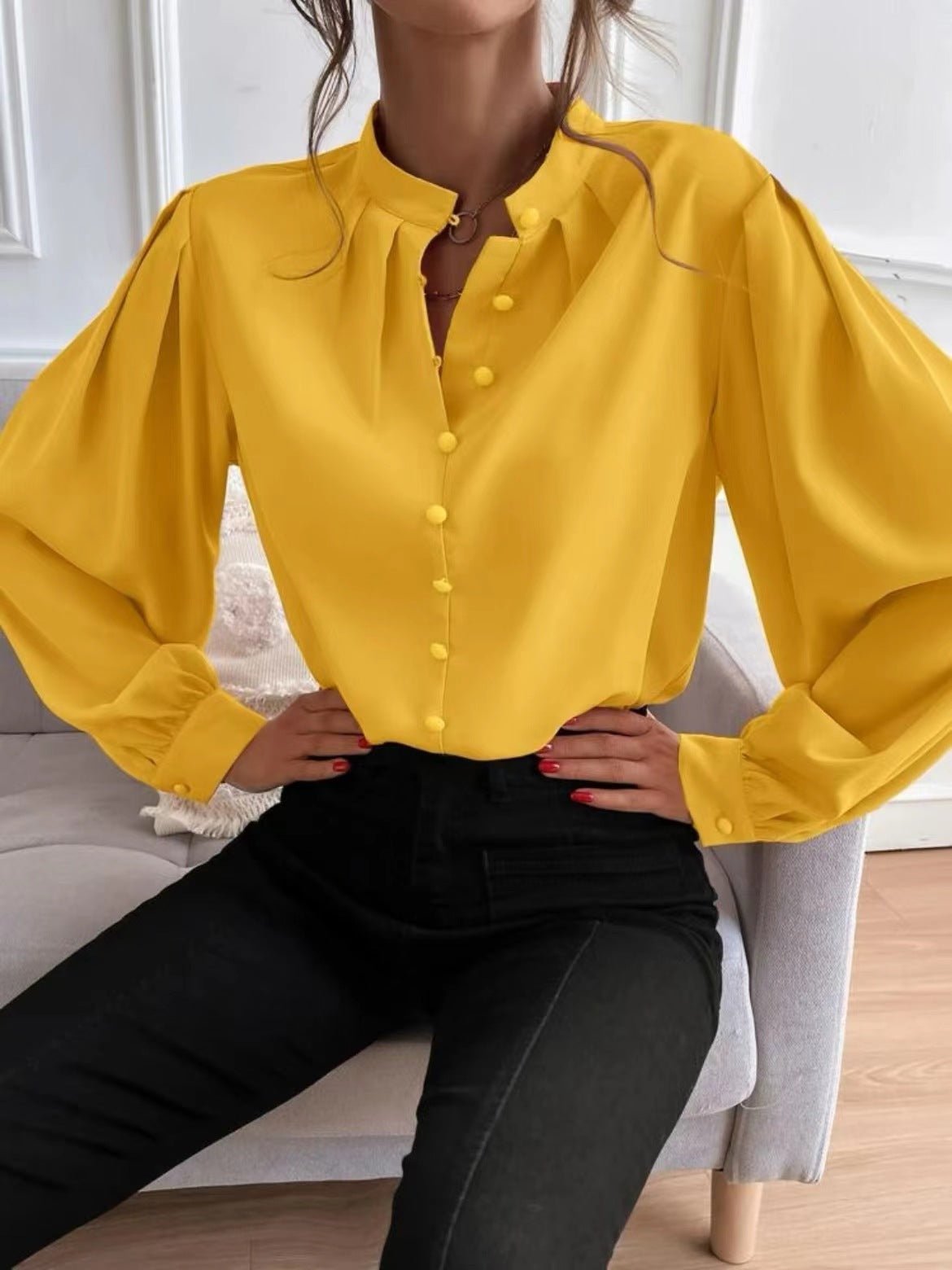 Elegant solid color women's long sleeve shirt with collar, buttons, and loose fit, perfect for autumn by Bella Mia.