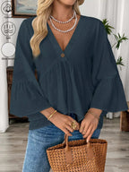 Women's white cotton V-neck blouse with bell sleeves, trendy and effortless chic style, designed by Trendsi.
