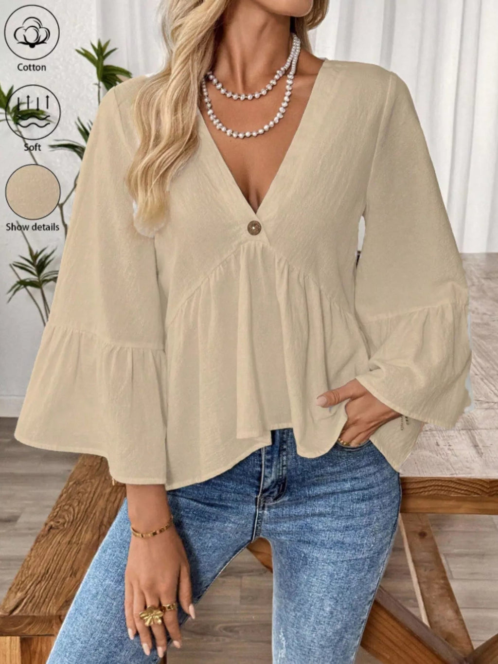 Women's 100% cotton V-neck bell sleeve blouse with a relaxed fit, featuring stylish bell sleeves for a chic, effortless look.