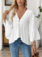 Women's 100% cotton V-neck bell sleeve blouse with a chic, effortless style, featuring flowy bell sleeves and a relaxed fit.